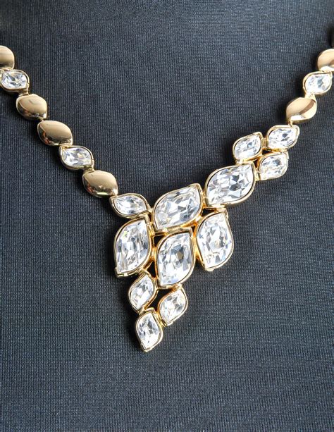 dior rhinestone necklace|Dior gold and white necklace.